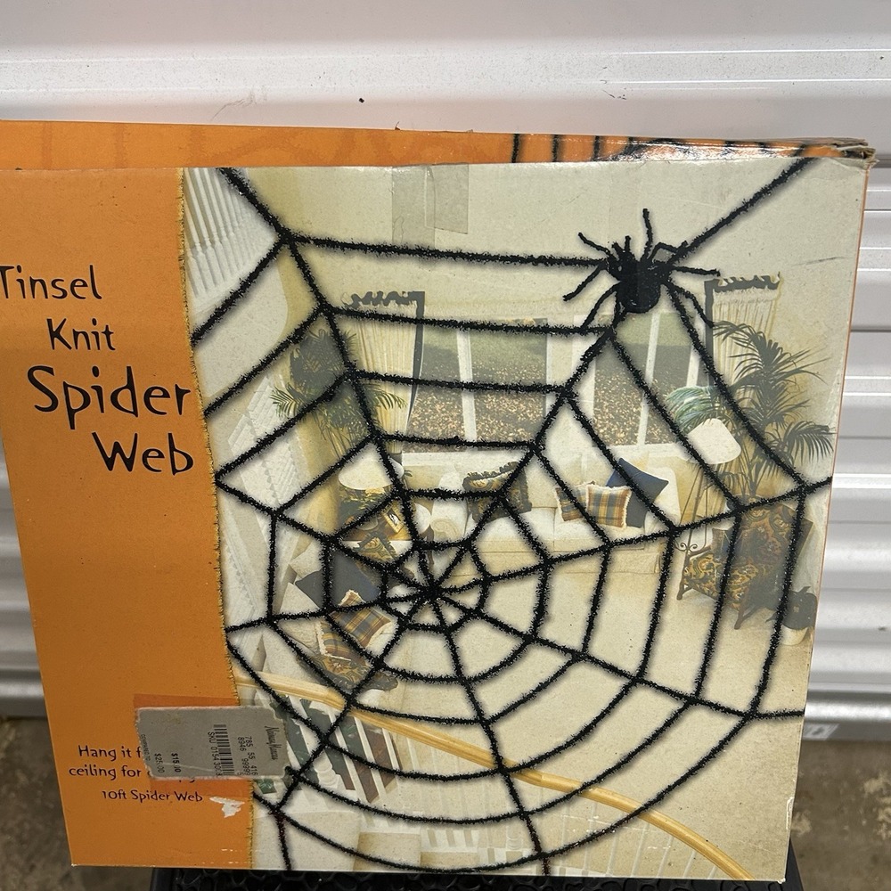 Department 56 RETIRED Tinsel Knit Spiderโ Web w/ Spider